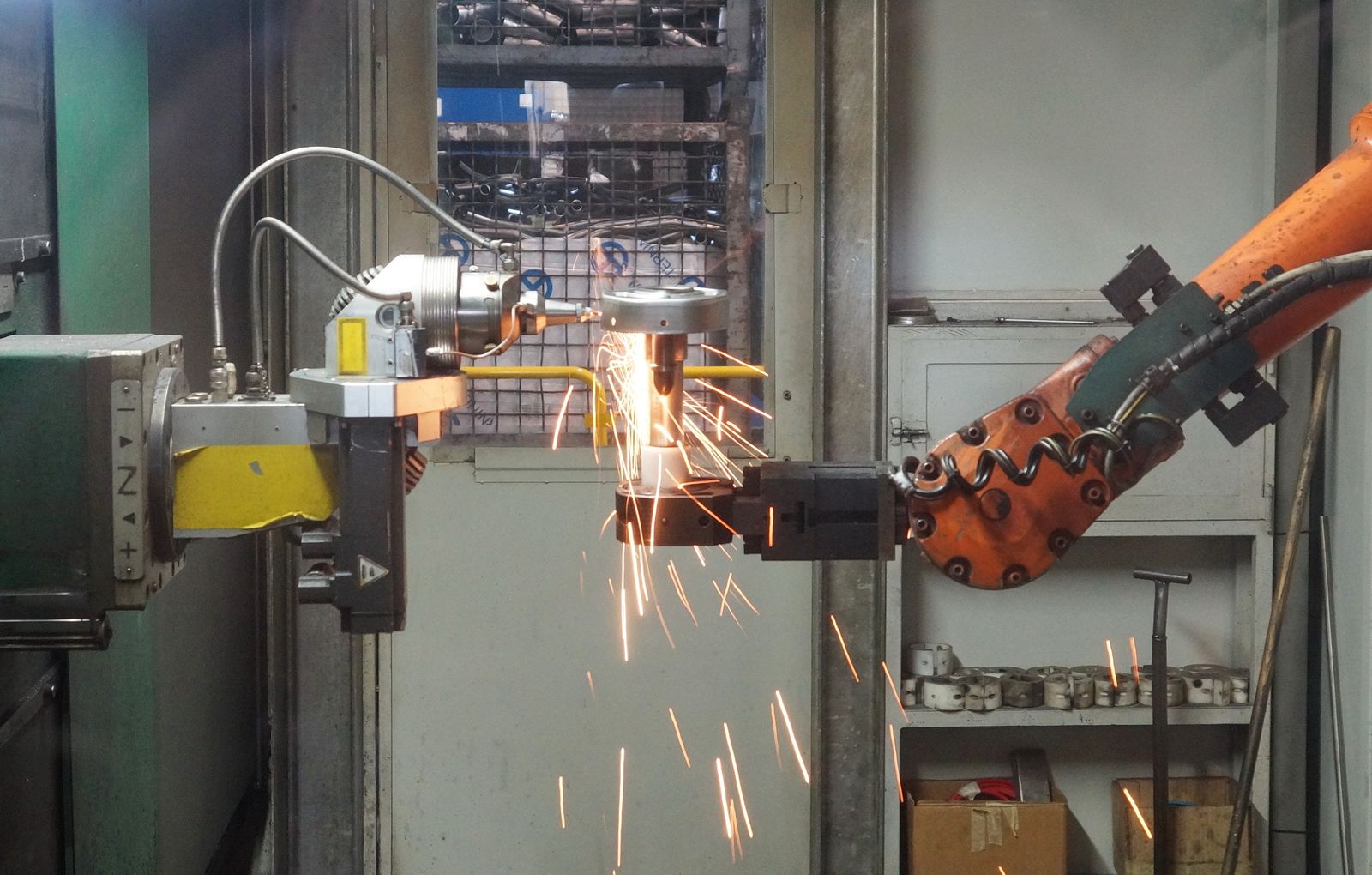 Robotic cutting cell producing precision components